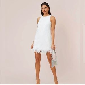 AIDAN BY ADRIANNA PAPELL
SEQUINED TRAPEZE HALTER DRESS WITH FEATHER TRIM.